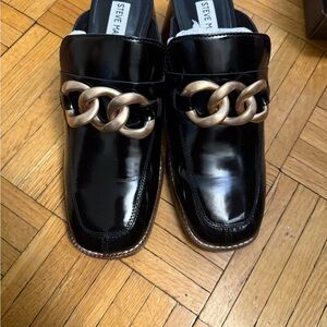 Steve Madden Glossy Black Loafers with Bronze Chain